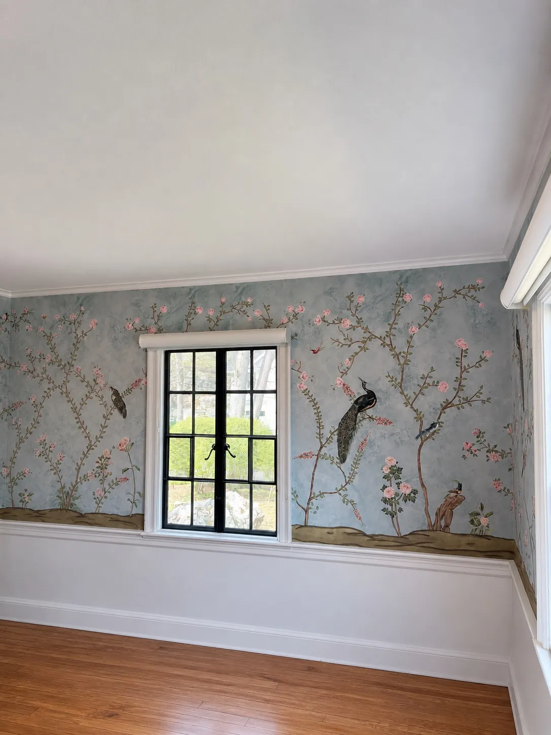 Floral wallpaper on a finished feature wall