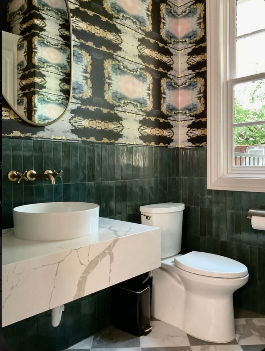 Wallpaper installer working with decorative wallcovering